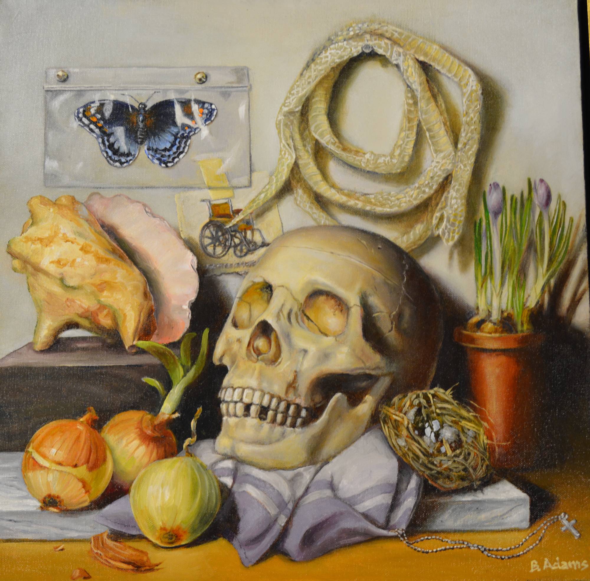Still life painting that includes a skull, snake sking, flowers, butterlfy, image of a wheelchair, onions and a shell.